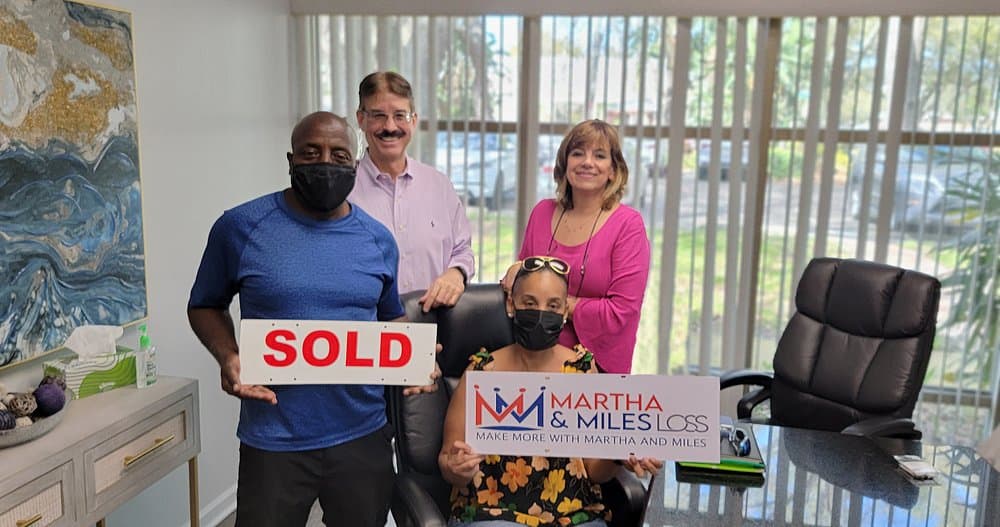 Martha Loss & Miles Loss - RE/MAX Collective